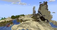The seed's spawn village and portal. (Image via Mojang)
